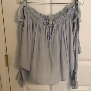 Off the shoulder, long sleeve top.